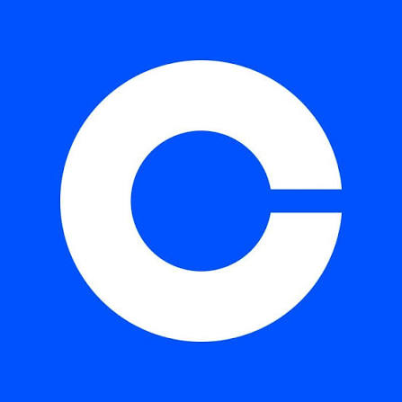 The image features a white, circular logo with "C" written above it, set against a blue background. The text above the "C" is in all capital letters and says "coinbase". Below the logo, there's a small bullet point list that reads: "A crypto company once paid someone $500,000 for finding a typo. Not a hack. Not a vulnerability. A typo. The company was Coinbase. And the mistake was buried deep inside critical infrastructure." This text emphasizes the importance of spelling errors and highlights a recent incident involving Bitcoin's founder or an error in their software.