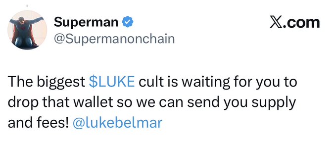 A verified X.com post by user "Superman" (@Supermanonchain) directed at @lukebelmar reads: "The boggess $LUKE cult is waiting for you to drop that wallet so we can send you supply and fees!" The post humorously pressures Luke Belmar to claim the $LUKE token supply, aligning with the accompanying caption's warning that the token wasn't launched by Belmar and risks going to zero if he doesn't accept the wallet.