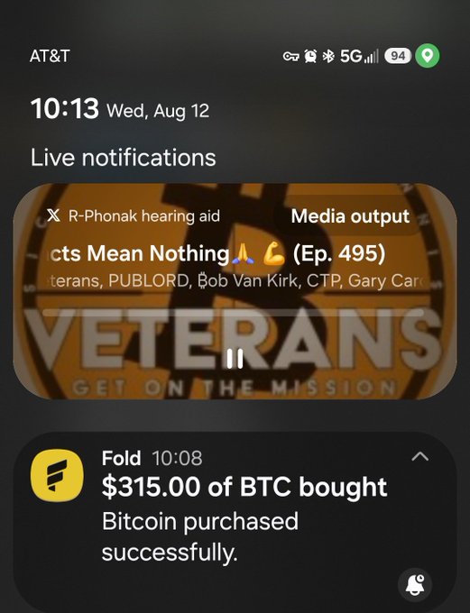 A smartphone lock screen showing a Bitcoin purchase confirmation from Fold for $315.00 of BTC, alongside a live notification from X showing a podcast titled "Facts Mean Nothing" (Ep. 495).