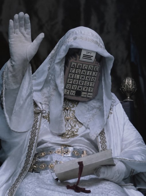 A figure draped in ornate white robes with gold embroidery sits holding a scroll, their face obscured by a vintage "SPY" alphabet cipher board. One gloved hand is raised in a gesture of proclamation, fitting the cryptic "QM" (Quant Messiah?) message warning of further market burns in $QSTRAT.