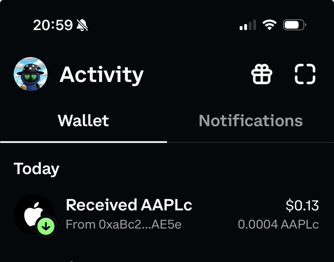 A mobile screenshot of a crypto wallet activity page showing a recent transaction to receive $0.13 (0.0004 AAPLc) from a sender with a truncated address.