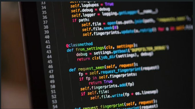 A close-up of a computer screen displays Python source code, including methods such as “from_settings” and “request_seen.”