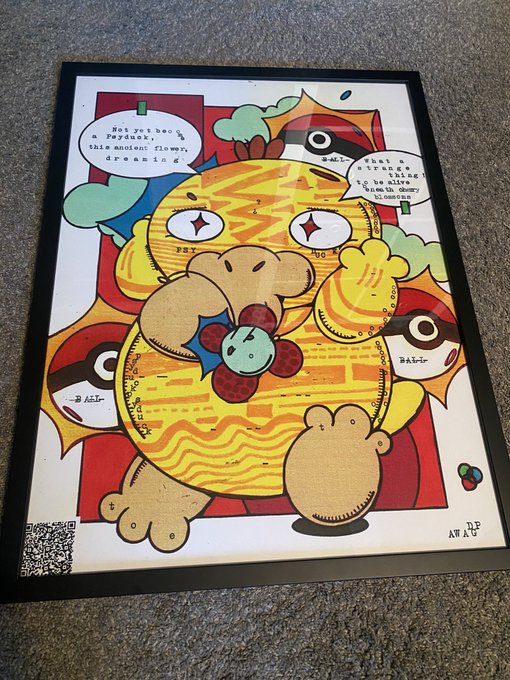 A framed cartoon-style illustration of a yellow, chubby creature with speech bubbles about 'weird duck, the nuclear clown' and 'baldraks' art titled 'AM I A U' by Kafkat.