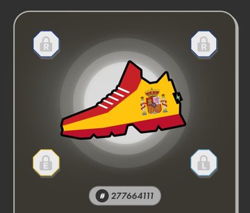 A digital collectible or token featuring a sneaker designed in the colors of the Spanish flag with a coat of arms, labeled with ID #277664111.