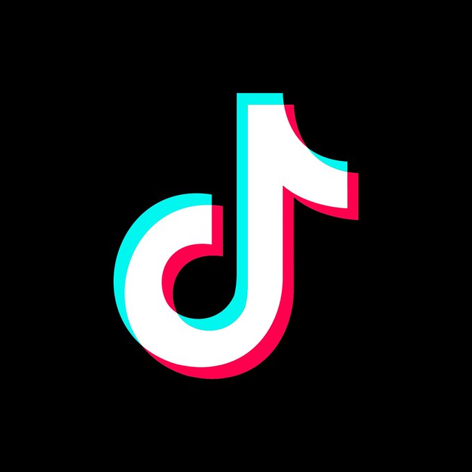 The image features the TikTok logo, a stylized music note in white with cyan and magenta glitch-effect outlines on a black background. The logo visually represents the TikTok brand being referenced in the news about TikTok's potential new money-sending feature through its TikTok Pay system in direct messages.