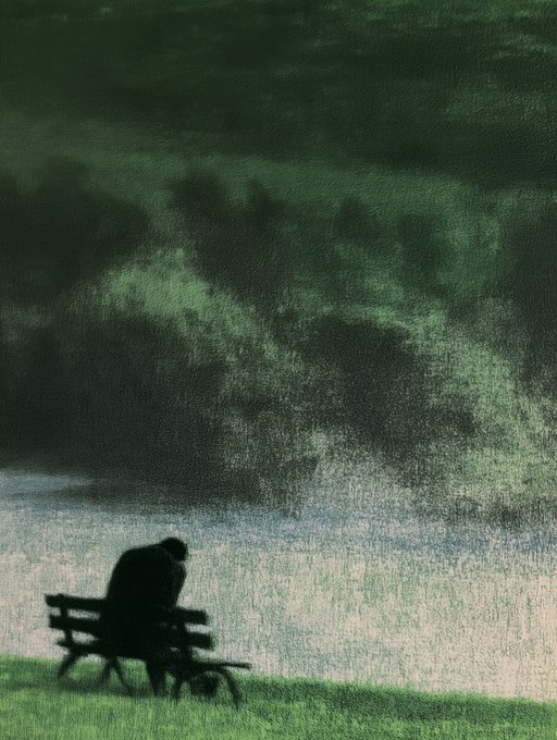 An artistic painting or illustration depicts a silhouetted figure sitting on a bench by water beneath a dark, moody green sky.