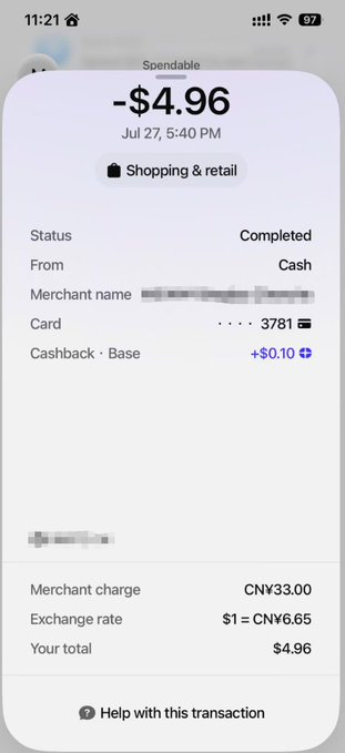 A screenshot of a completed U card transaction showing a -$4.96 charge on July 27 at 5:40 PM for shopping/retail, which included a +$0.10 cashback reward. The transaction details show a merchant charge of CN¥33.00 converted at an exchange rate of $1 = CN¥6.65, illustrating the card's cashback feature in action as mentioned in the post.
