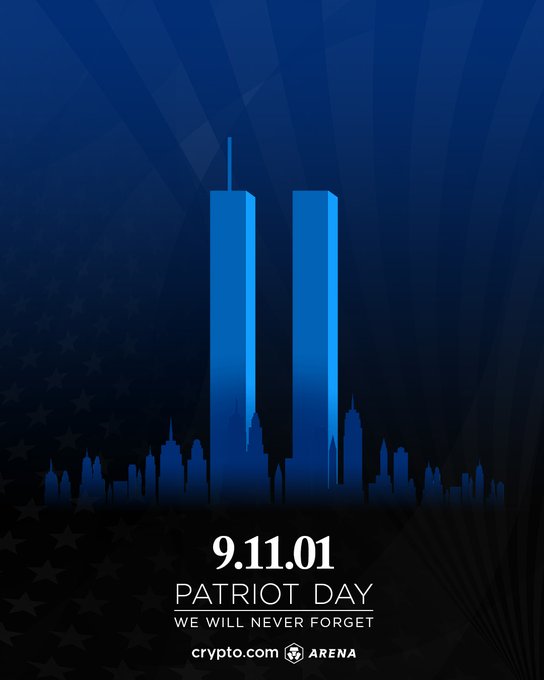 A solemn Patriot Day tribute featuring the Twin Towers silhouetted against a blue background with stars and rays, displaying "9.11.01 PATRIOT DAY WE WILL NEVER FORGET" along with the Crypto.com Arena logo, honoring the memory of those lost in the September 11 attacks.