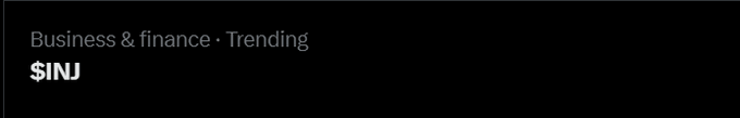 A dark-themed banner displaying the text 'Business & finance · Trending' above the ticker '$INJ' in white lettering.