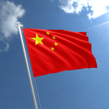 The image features a red flag with yellow stars, flying high against a blue sky with white clouds. The flag appears to be waving in the wind, adding a sense of motion and dynamism to the scene. In the background, there are some words that read "remarkable" and "Chinese court has ruled Bitcoin is legally recognized as property." This text provides context about an interesting legal case involving Bitcoins and China's currency system. The combination of the flag flying high in the sky with the intriguing legal development creates a visually engaging scene.