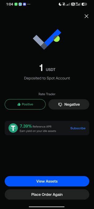 A mobile app confirmation screen showing a deposit of 1 USDT to a Spot Account via Rate Trader with a 7.39% Reference APR.