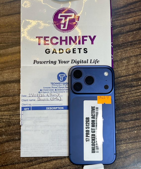 A blue iPhone 17 Pro 512GB (unlocked, non-active) rests on a Technify Gadgets receipt dated 23/07/26 for client "Dennis," marking the completion of the first of four goals celebrated in the post.