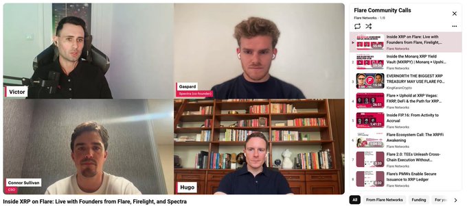 The image shows a group of four men sitting behind a bookshelf, with their faces displayed on a computer screen for an online meeting or video call. The background features a bookshelf filled with numerous books, suggesting that they are discussing something related to literature or knowledge sharing.