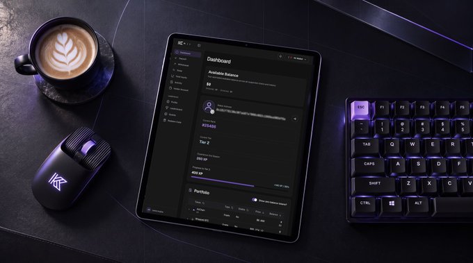 A sleek workspace featuring a tablet displaying a dark-themed "Dashboard" with "Available balance," "Tier 2," and "400 BP," alongside a backlit mechanical keyboard and gaming mouse, complemented by a latte with leaf art—blending productivity and leisure into a "Work-ish" vibe.