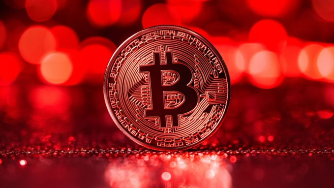 A golden Bitcoin coin stands upright against a vivid red, bokeh-lit background, symbolizing the looming threat highlighted in the post: that existing cryptographic vulnerabilities—not quantum computing—already put $38,000,000 in BTC at risk, with 34% of all Bitcoin held in addresses with exposed keys.