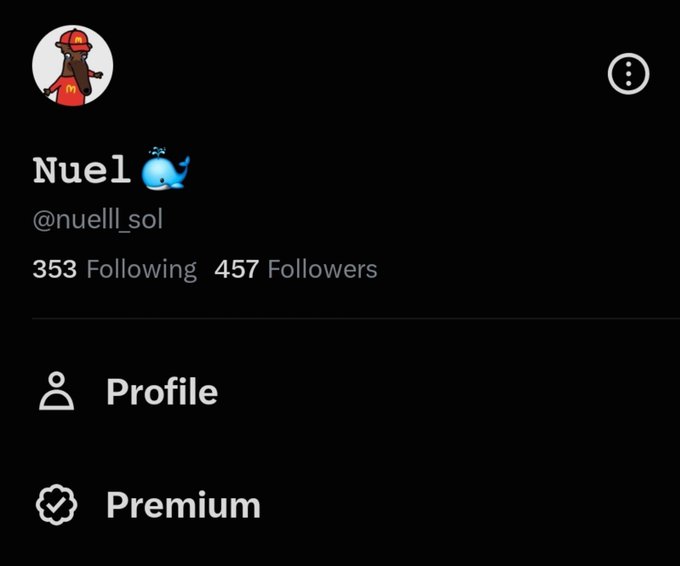 A social media profile page for user 'Nuel' (@nuell_sol) with a whale emoji, showing 353 Following and 457 Followers, with menu options for Profile and Premium.