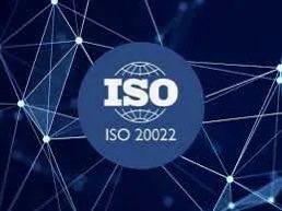 A logo for ISO 20022 displayed on a dark blue background with a network node pattern.