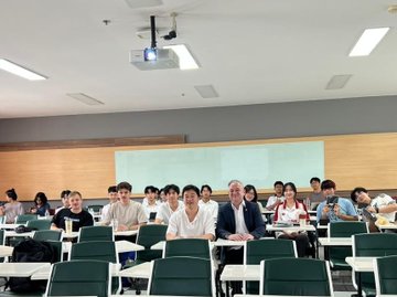 A group of students and faculty are seated in a classroom at KMITL (King Mongkut's Institute of Technology Ladkrabang) in Bangkok, where a recent lecture or workshop on self-custody and crypto security took place. The image captures the engaged audience of engineering students and a guest speaker, reflecting the educational exchange mentioned in the post.