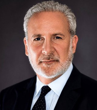 A professional headshot of Peter Schiff, a financial commentator, wearing a dark suit and patterned tie against a dark background, accompanying commentary on U.S. 30-year mortgage rates and Federal Reserve policy.