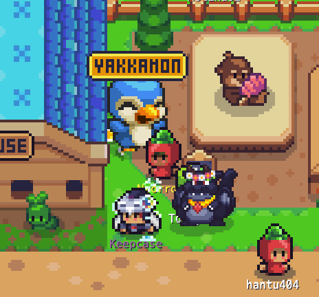 A pixel art video game scene showing various character sprites including a black penguin-like figure, a red berry character labeled 'hantu004', a white-haired character labeled 'Keepcase', and a nameplate reading 'YAKKAMON' with a small bird and a brown creature on a tan mat.