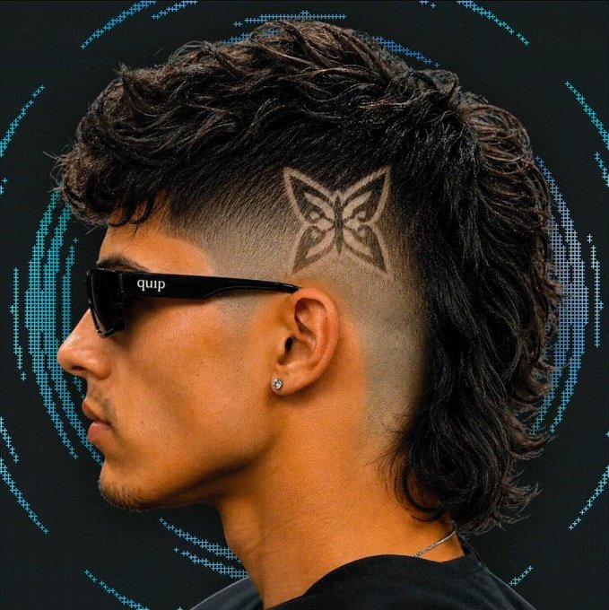 The image features a man with a mohawk hairstyle, wearing sunglasses and glasses. The background of the photo has a blue circular pattern that stands out against the dark background. There are also words visible in the image, which seem to be related to the content of the post about AI and machine learning.
