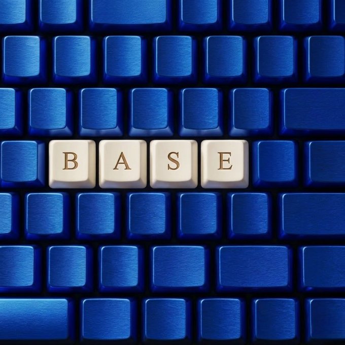 A blue computer keyboard features four white keys standing out from the rest, spelling out "BASE." The image cleverly connects the "Base" name to a literal keyboard base, fitting a post asking about favorite aspects of Base.