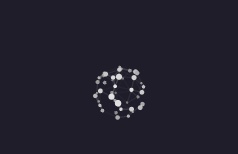A loading icon consisting of dots arranged in a circular pattern on a dark blue background.
