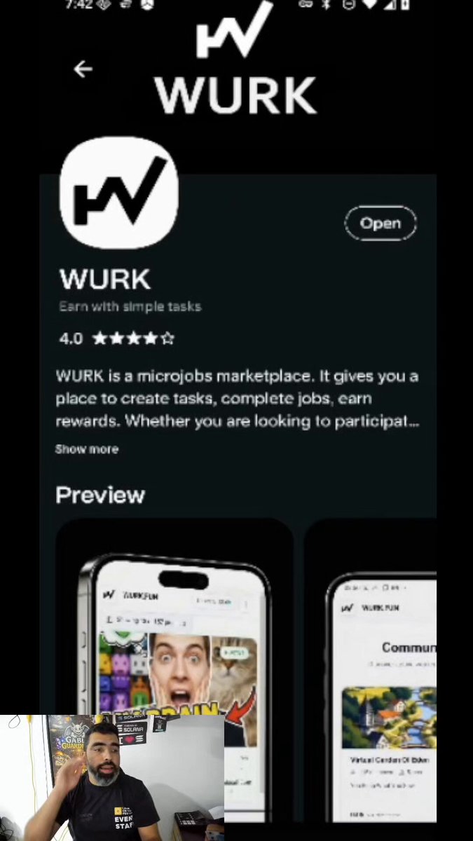 The image shows a cell phone screen with an app called WURK, which appears to be a social media platform for people to share their thoughts or ideas. The user has posted something about a man wearing a shirt that says "WURKDOTFUN". This post is related to the WURKDOTFUN app and seems to be promoting it on the cell phone screen.