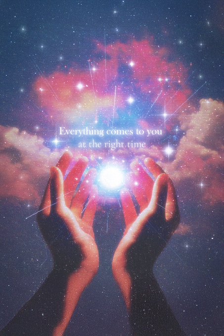 The image features a pair of hands reaching towards the sky, with stars scattered throughout the background. The text "Everything comes to you at the right time" is written above the hands, which appears to be a quote or motivational message related to the scene.