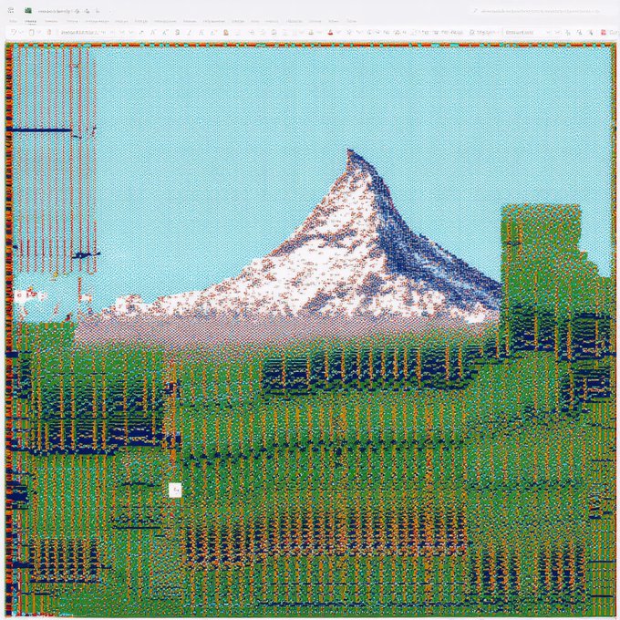 A corrupted or glitched digital image showing a pixelated mountain landscape resembling the Matterhorn, with severe green and red color distortion rendering much of the scene illegible.