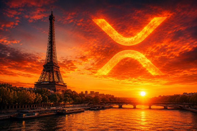 A dramatic sunset view of the Eiffel Tower and the Seine River in Paris, with a fiery orange and red sky featuring a large XRP (Ripple) logo glowing in the clouds above the city.