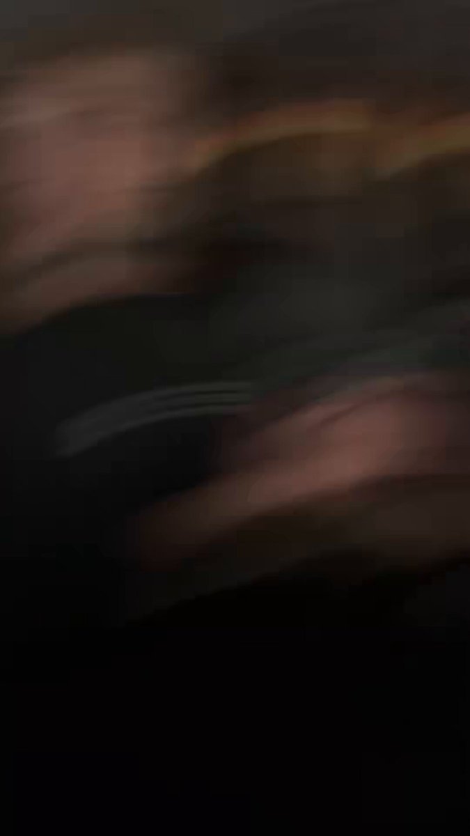 The image shows a blurry picture of a person's face, possibly taken from a low angle or at an awkward moment when they were taking the photo. The background appears dark, which further emphasizes the focus on the subject. The caption provided seems unrelated to the image and does not provide any context about the content of the image.