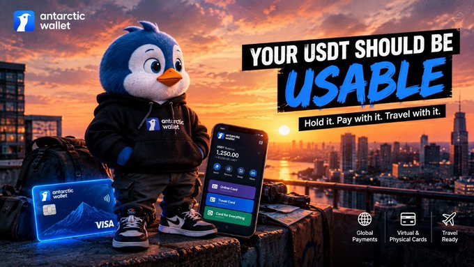 An advertisement for 'Antarctic Wallet' featuring a penguin mascot holding a smartphone, with the text 'YOUR USDT SHOULD BE USABLE - Hold it. Pay with it. Travel with it.'