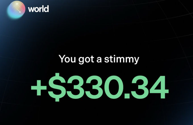 A promotional image from World (world_xyz) announces a "stimmy" reward of +$330.34, likely showing earnings from their prediction market airdrop campaign where users can earn free crypto by connecting a Phantom wallet and X account to make trades on the platform.