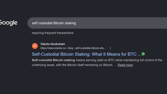 The image shows a Google Chrome browser window with a search bar at the top, displaying a message about self-custodial Bitcoin staking. The text in the search bar suggests that people are searching for information related to this specific topic. This indicates an interest in understanding how to use Bitcoin as a means of currency and potentially investing in it.