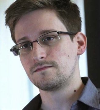 A close-up portrait of Edward Snowden, who is referenced in the accompanying text as having anonymously participated in the secret 2013 cryptographic ceremony that gave birth to Zcash from the Zerocoin protocol.