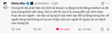 A blurry screenshot of a Facebook post by Nikita Bier mentioning a phishing attack on 42,000 Facebook accounts using chatbot and human-controlled Instagram and X accounts to scam users, with 20 người (people) highlighted.