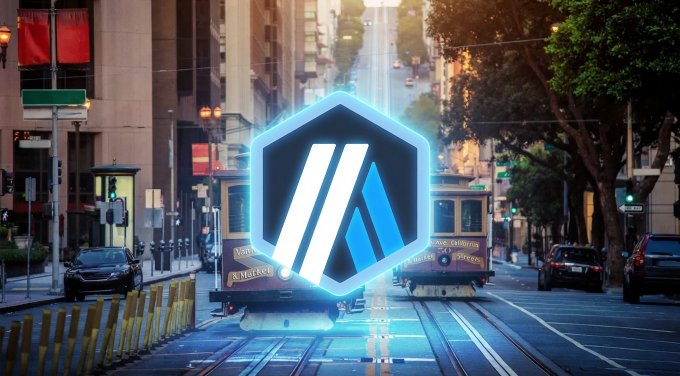 A glowing blue hexagonal logo is overlaid on a San Francisco street scene featuring cable cars, with 'Van Ness' visible in the background.