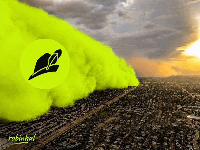 An aerial view of a city landscape at sunset with a large plume of bright green smoke and a logo resembling Robinhood, with 'robinhat' text in the corner.