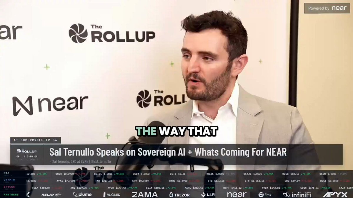 The image shows a man wearing a suit talking into a microphone while standing against a white background, which appears to be a wall or screen. The text "The way that" can be seen at the bottom of the image, suggesting that Sal Ternullo is speaking about Near's role in the Venice private AI stack. Near's private inference is one of the underlying assumptions for how users interact with AI.