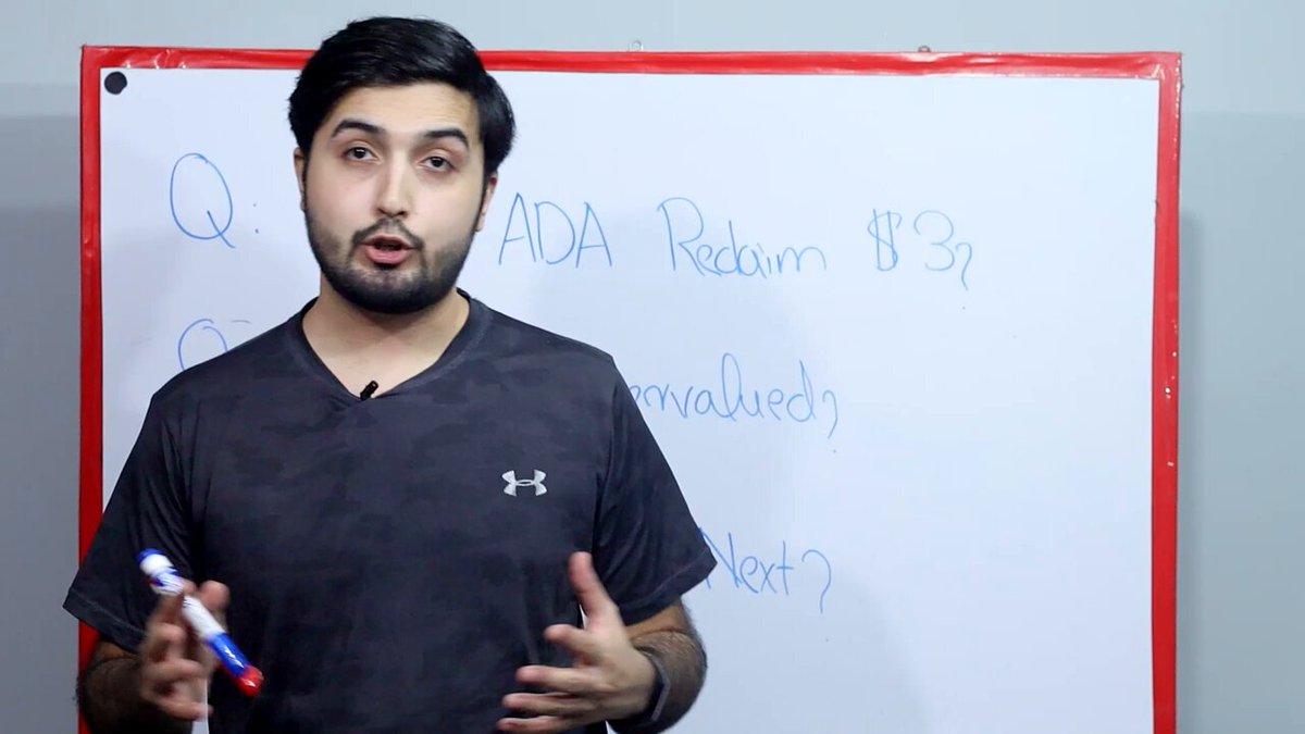 In this image, there's a young man standing in front of a whiteboard with some questions written down. The man seems to be giving instructions or sharing information about a topic related to cryptocurrencies. There are also some terms like "ADA Redim B83", which could potentially be related to Bitcoin or another cryptocurrency, but more context would be needed to definitively determine their significance within the image. Additionally, there is a cup placed on the whiteboard, possibly containing a drink for someone who will be attending this presentation. The overall atmosphere of the image suggests that it might be a lesson, a demonstration, or an explanation related to cryptocurrency-related matters.