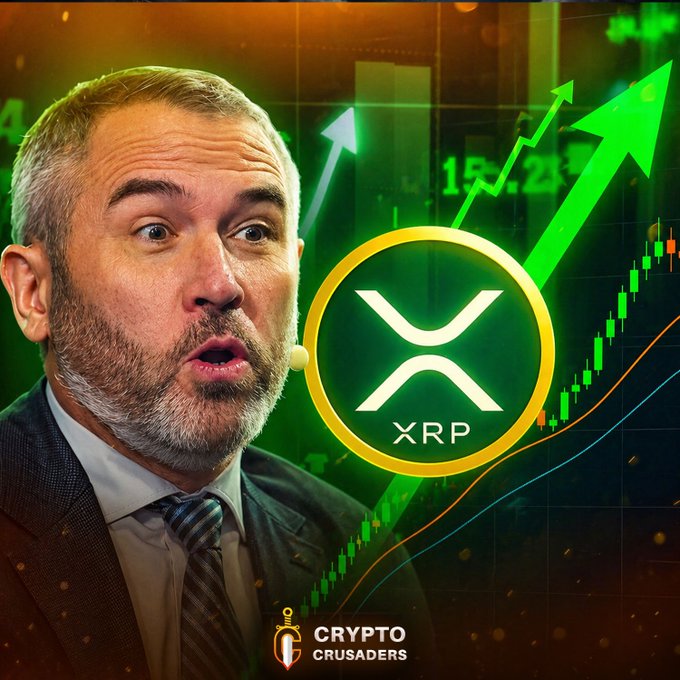 The image features a man wearing a suit, with his mouth open as if he's making a funny face or speaking. The background of the image shows a graph with arrows pointing upwards, indicating an upward trend. There are also two coins placed on top of the image - one is a gold coin and the other is a silver coin. The text in the image reads "HUGE: Ripple'S Brad Garlinghouse: We're taking over SWIFT".