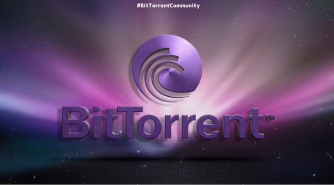 BitTorrent logo banner featuring the purple BitTorrent swirl emblem with 'BitTorrent™' text on a purple cosmic background with light rays, '#BitTorrentCommunity' at top and 'downloaded.in/book.' at bottom.
