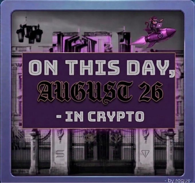 A stylized purple-themed graphic reading 'ON THIS DAY, AUGUST 26 - IN CRYPTO' by 'rogue', featuring a cartoon monkey riding a rocket ship above a palace-like building.