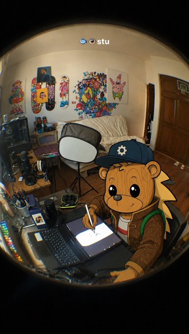 A cartoon porcupine wearing a blue cap with a gear logo draws on a tablet at a desk surrounded by colorful artwork in a fisheye-lens room, with "stu" displayed at the top. The whimsical character appears to be illustrating or analyzing, fitting the post's theme of turning thoughts and predictions into visualized, tradeable ideas.