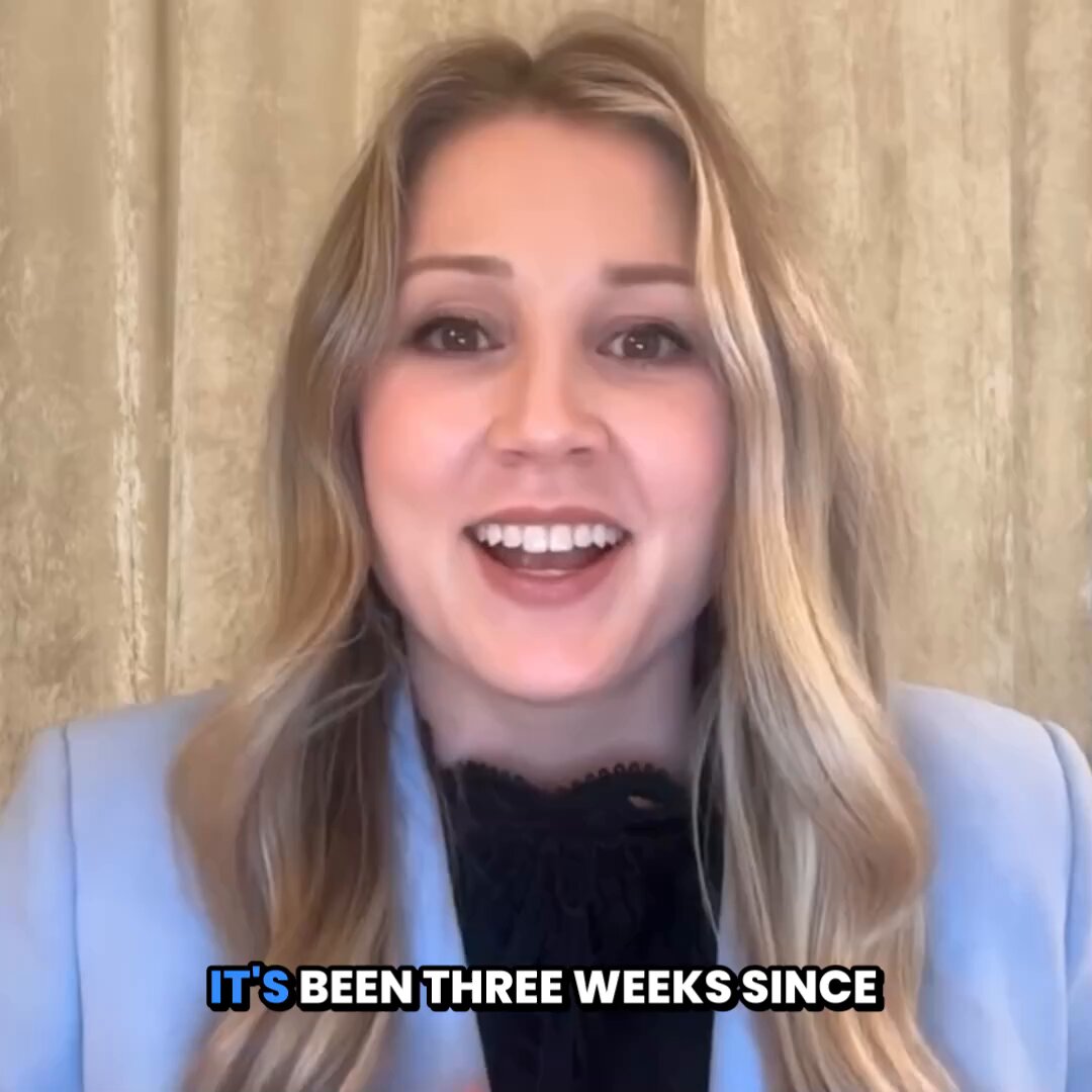 The image features a woman with blonde hair wearing a blue blazer, smiling at the camera. The caption below her photo reads "It's been three weeks since Independence Day", indicating that she has been documenting this event for quite some time.