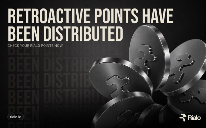 A promotional graphic announcing "RETROACTIVE POINTS HAVE BEEN DISTRIBUTED" with a prompt to "CHECK YOUR RIALO POINTS NOW," featuring metallic black circular tokens with the Rialo logo, reinforcing the post's message that past contributions to the Rialo ecosystem have now been credited to users' points balances at playground.rialo.io.