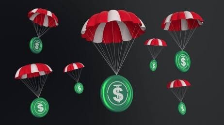 Multiple green USDC stablecoin tokens descend with red and white parachutes against a dark background.