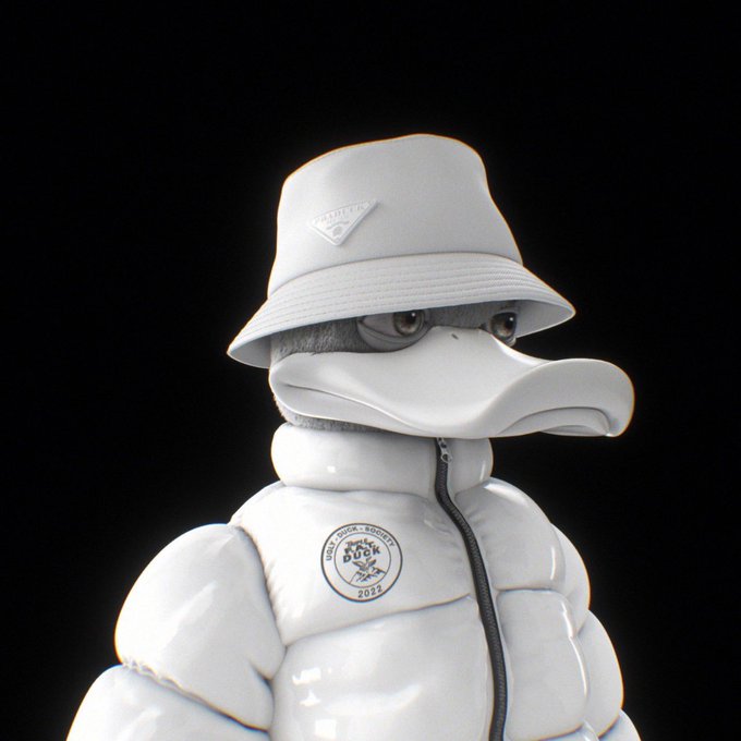A glossy white 3D-rendered duck figure wears a matching white Prada bucket hat and puffer jacket with a 'DUCK 2024' badge.