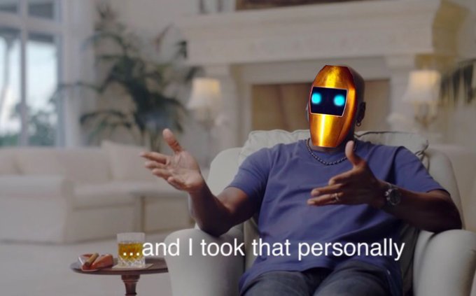 A meme image of a person wearing a metallic robot mask with glowing blue eyes, sitting on a couch and gesturing, with the subtitle 'and I took that personally'.